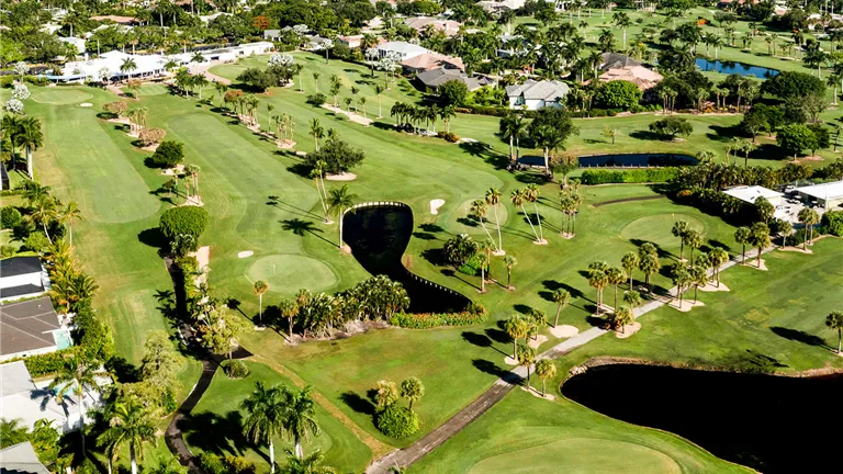 Scenic view of The Moorings Golf Course with green fairways