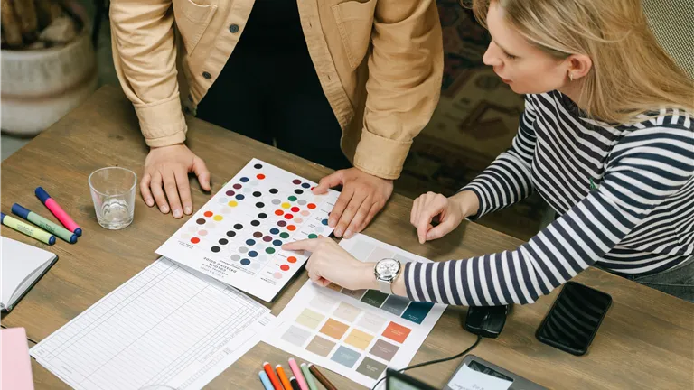 A collaborative team workspace focusing on planning using color charts and documents.